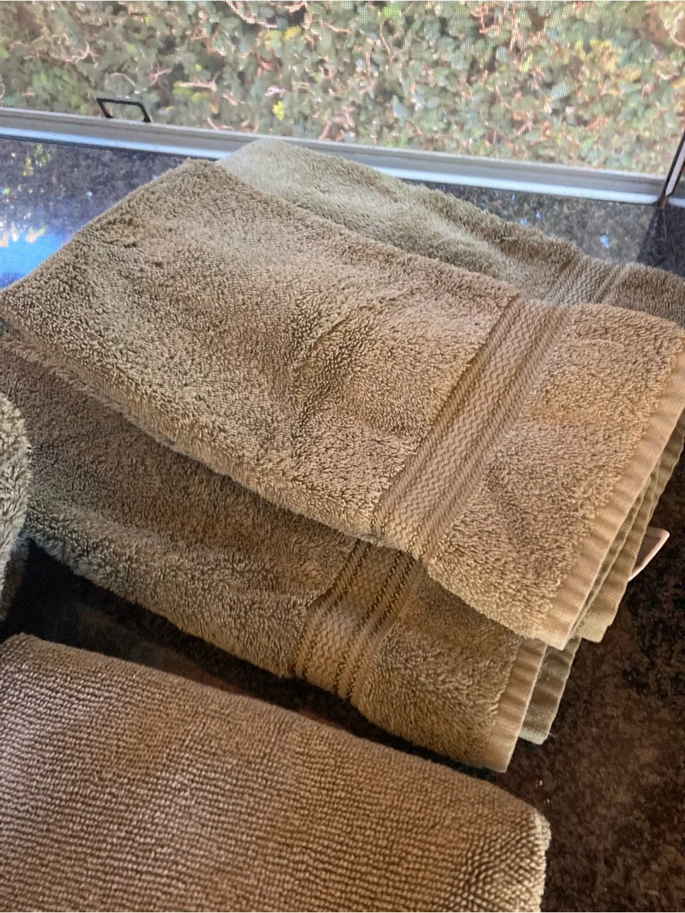 2 Croscill towels, 3 hand towels and 1 bath mat.